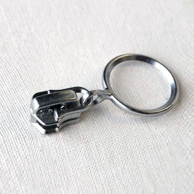 YKK® #4.5 White Style B Single Locking Metal Zipper Pull (Coil Chain)